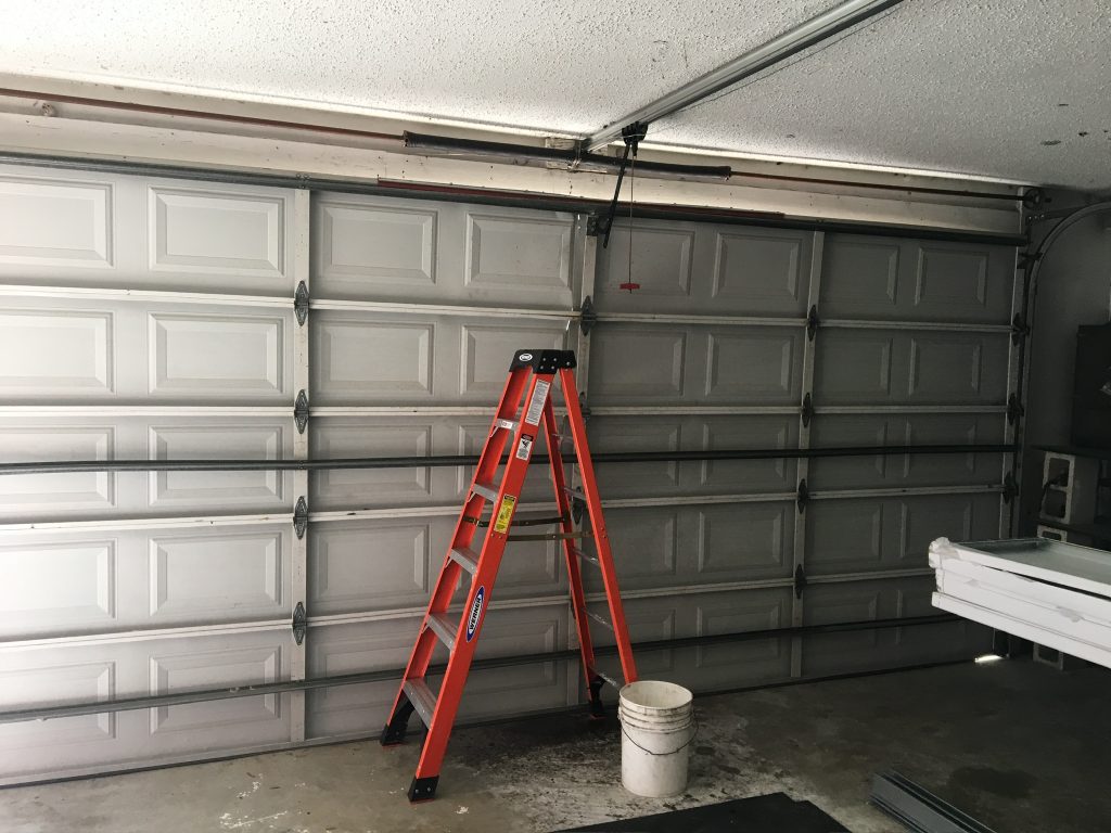 how to reengage garage door